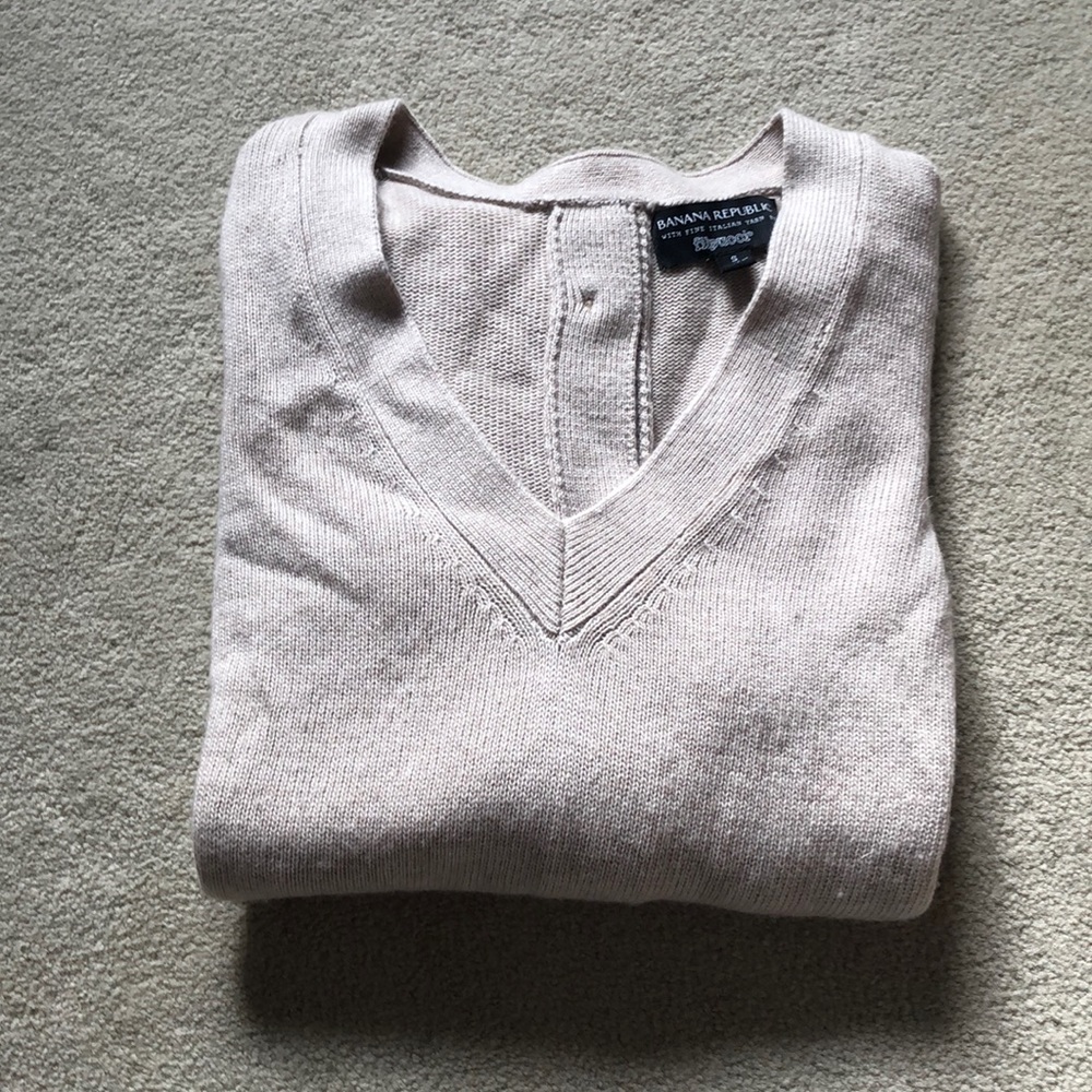 V neck sweater with buttons down back